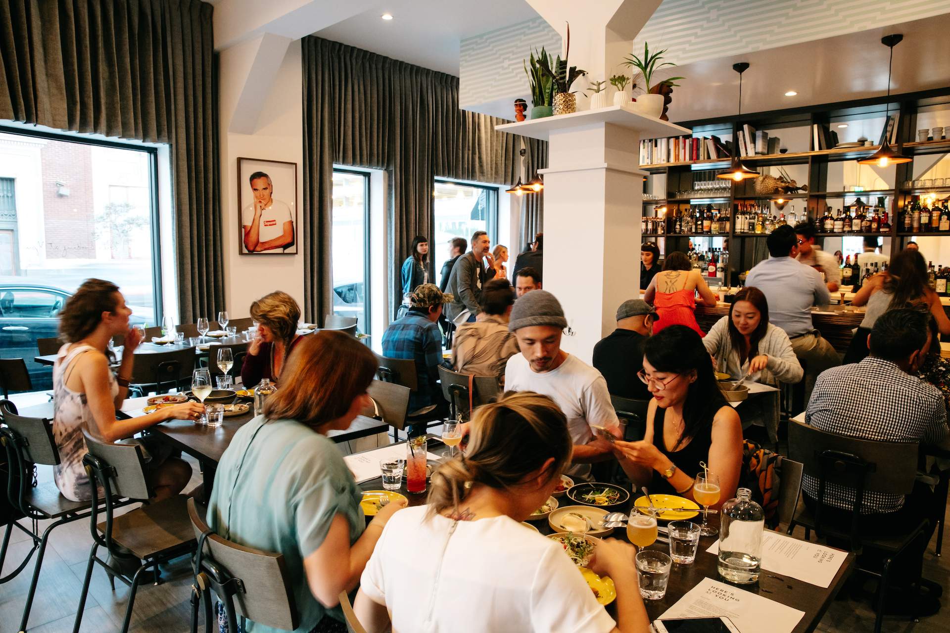 Here's Looking At You A group of diners eating inside LA's Here's Looking At You