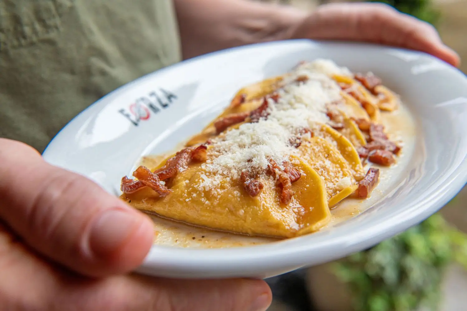 forza Ravioli on a white oval plate at Forza Storico in Atlanta
