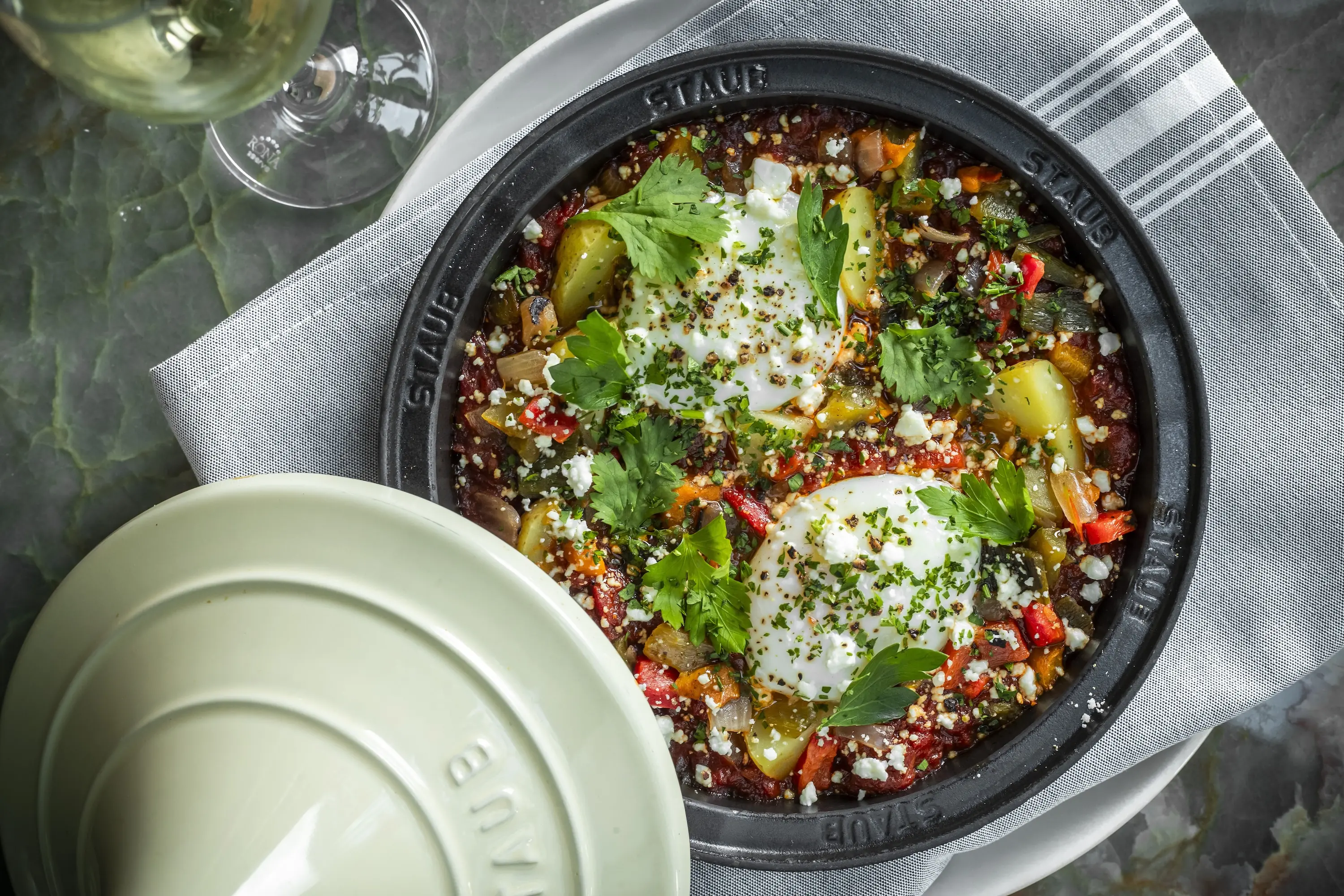 A shakshuka in a ceramic vessel at the restaurant Del Mar in West Palm Beach