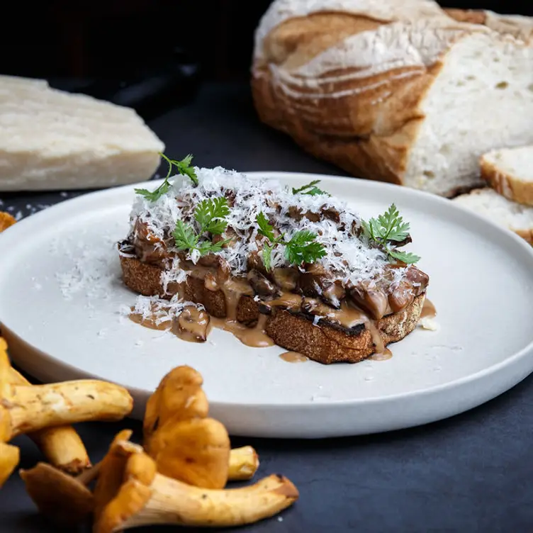 tableau-bar-bistro1 A piece of bread with mushrooms on top, at one of Vancouver’s best French restaurants.